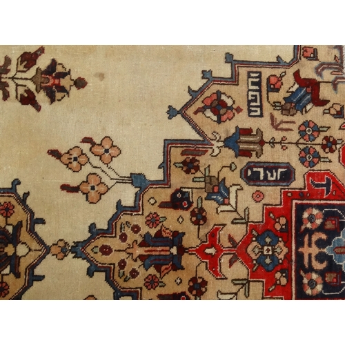 2041 - Rectangular Middle Eastern Tabriz rug, the central field and boarders with a stylised floral design,... 