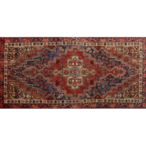 2053 - Rectangular Middle Eastern Hamadan rug, the central field and boarders with a stylised floral design... 