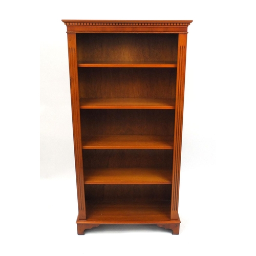 70 - Yew wood open book case fitted with five adjustable shelves, 150cm high x 77cm wide x 28cm deep