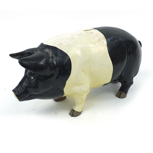 50 - Cast iron pig money bank, 42cm long