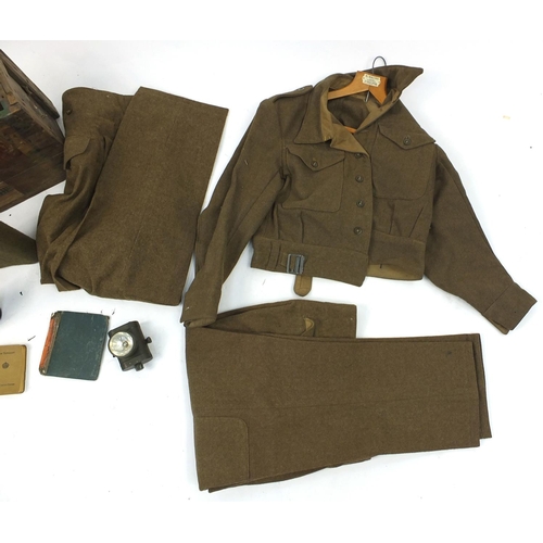 715 - Second World War Military interest jacket and trousers and a small selection of items including oil ... 