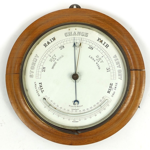 65 - Wall mounted barometer together with two oil lamps