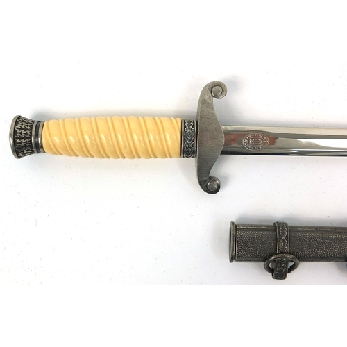 703 - German military style dagger with scabbard, 40cm long