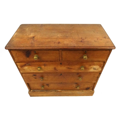20 - Victorian pine five drawer chest with brass handles, 83cm high x 97cm wide x46cm deep