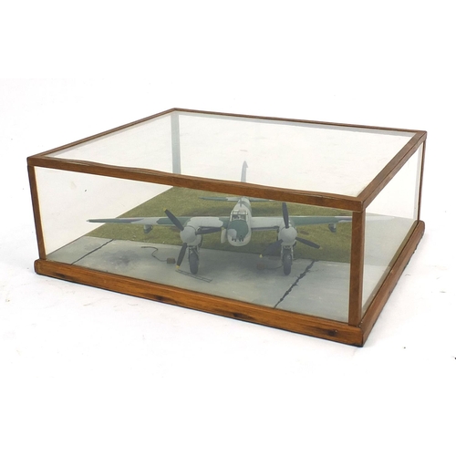 708 - Model aeroplane housed under a Perspex and wooden case, 39cm wide