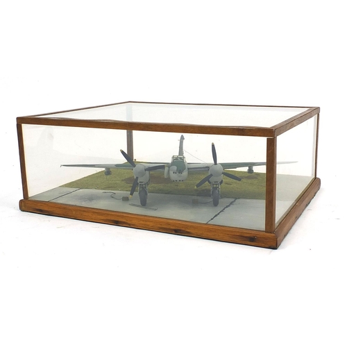 708 - Model aeroplane housed under a Perspex and wooden case, 39cm wide