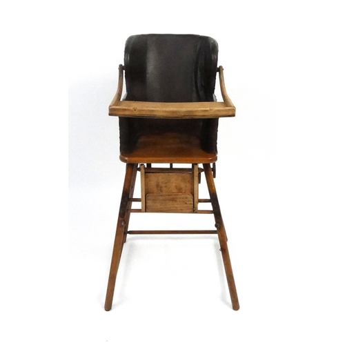 115 - Vintage childs metamorphic wooden high chair with leatherette upholstered seat, 100cm high