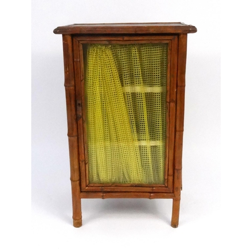 81 - Vintage bamboo cabinet with three shelved interior and glass door, 93cm high x 56cm wide x 42cm deep