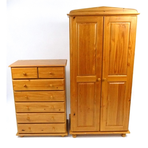 47 - Pine two door wardrobe and matching seven drawer chest