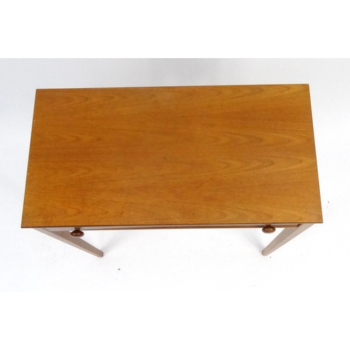 87 - Good quality side table with frieze drawer on tapering legs, 72cm high x 69cm wide x 35cm deep