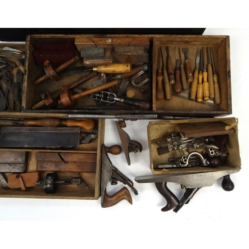 90 - Pine chest of antique and later tools including planes, chisels, pliers etc