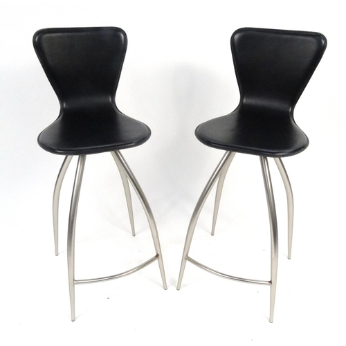 129 - Pair of The Chair Company polished metal and black leatherette bar stools