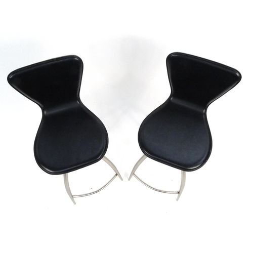 129 - Pair of The Chair Company polished metal and black leatherette bar stools