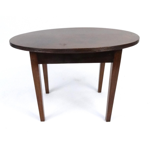 149 - Oval walnut occasional table, 49cm high