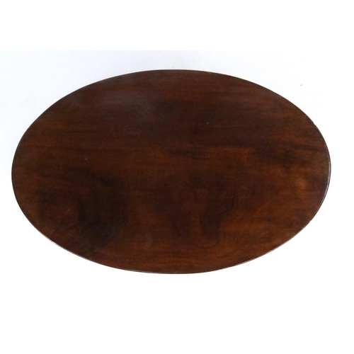 149 - Oval walnut occasional table, 49cm high