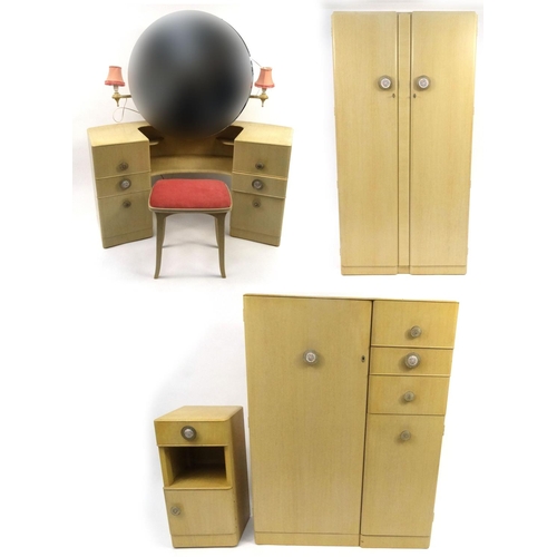 64 - 1950's limed oak bedroom suite comprising two door wardrobe, tallboy, dressing table and stool and b... 