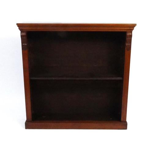 39 - Walnut open bookcase fitted with adjustable shelf, 105cm high x 107cm wide x 28cm deep