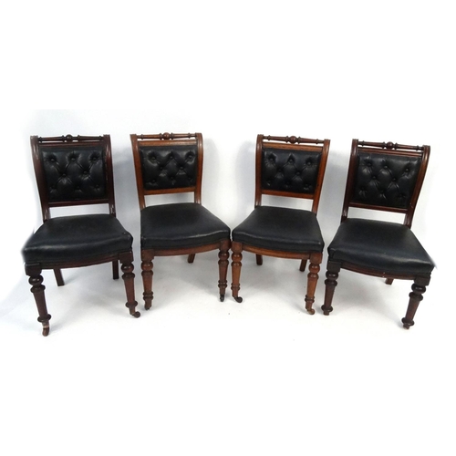 66 - Two pairs of Victorian dining chairs with black leatherette backs and seats, raised on turned legs a... 