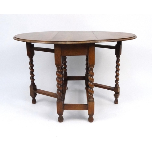 82 - Oak barley twist gate leg table 72cm high x 118cm wide (extended) x 90cm deep