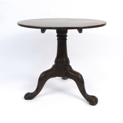 38 - 18th century tilt top table with shell carved knees and ball and claw feet, 69cm high x 76cm in diam... 