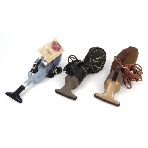 161 - Three vintage hand held vacuum cleaners, two Hoover and one Goblin