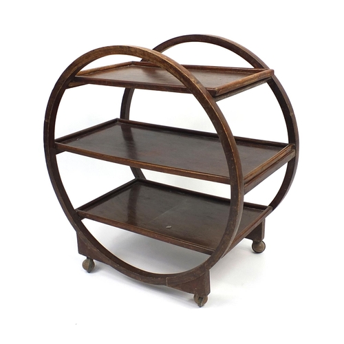 117 - Art Deco circular oak three tier tea trolley, 68cm high