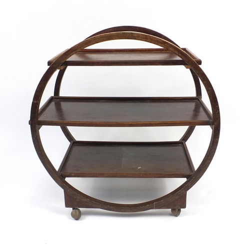 117 - Art Deco circular oak three tier tea trolley, 68cm high