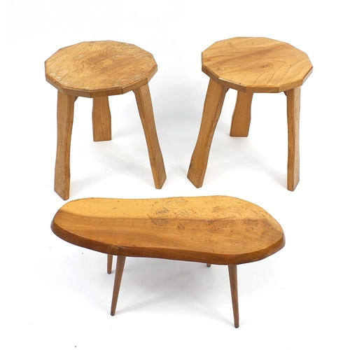 99 - Three ash naturalistic stools, one with Elton furniture label