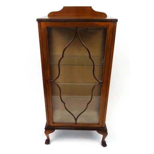 24 - Glazed oak china cabinet fitted with two glass shelves raised on cabriole legs and ball and claw fee... 