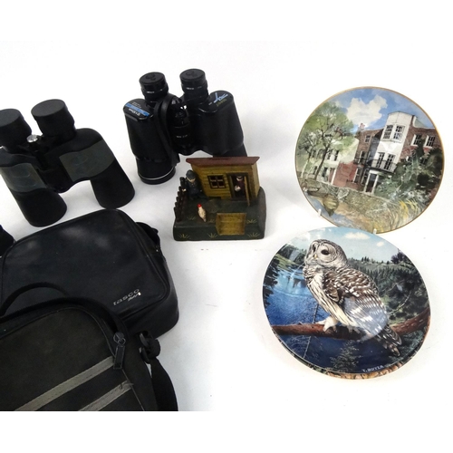 711 - Three pairs of assorted binoculars and a novelty cast iron money bank and four Royal Doulton collect... 