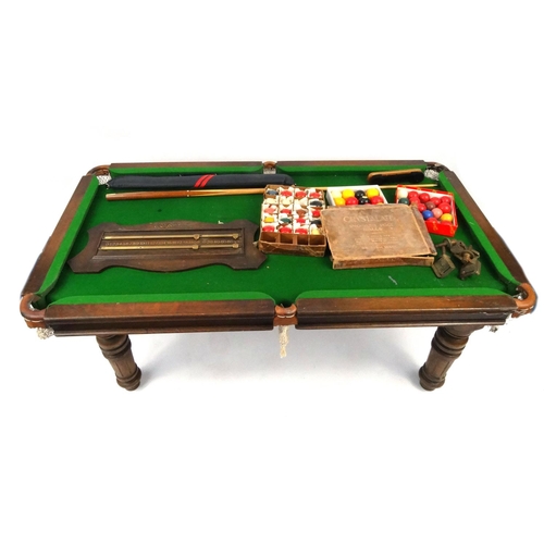 72 - Riley snooker table, a Riley scoreboard, with a selection of cues and balls, the table 74cm high x 1... 