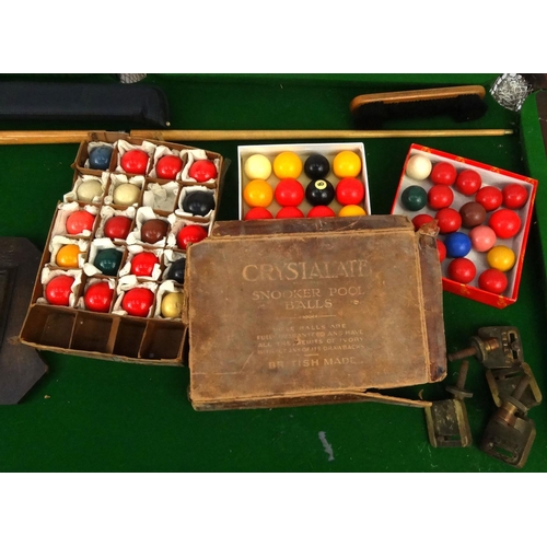 72 - Riley snooker table, a Riley scoreboard, with a selection of cues and balls, the table 74cm high x 1... 