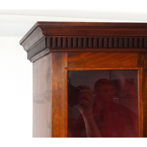 1 - Edwardian inlaid mahogany glazed bookcase, raised on square legs and under tier, 183cm high x 98cm w... 