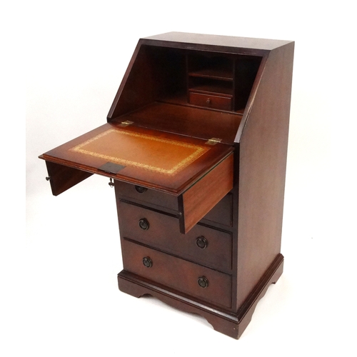 97 - Slim mahogany bureau fitted with a fall above four drawers, 97cm high x 50cm wide x 42cm deep