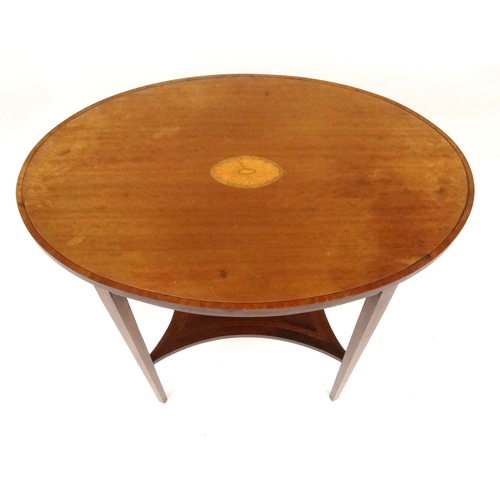 10 - Oval Edwardian inlaid mahogany occasional table with under tier, 70cm high x 76cm wide x 50cm deep