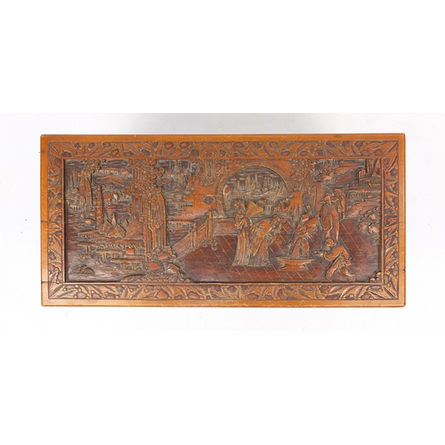 2 - Oriental  camphorwood trunk carved with figures amongst landscapes, 47cm high x 94cm wide x 45cm dee... 