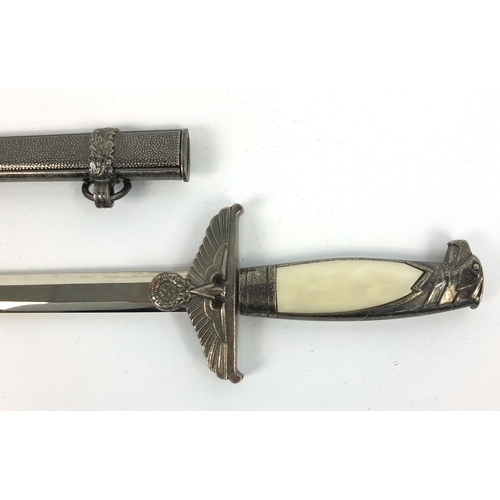 702 - German Military style dagger with sheath, 39cm long