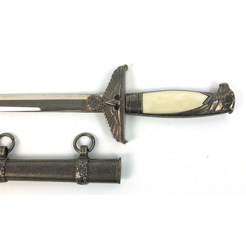 702 - German Military style dagger with sheath, 39cm long