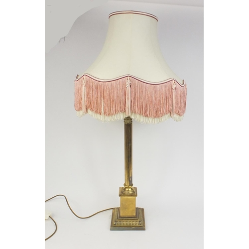 153 - Brass reeded column table lamp with silk lined tasselled shade, 96cm high