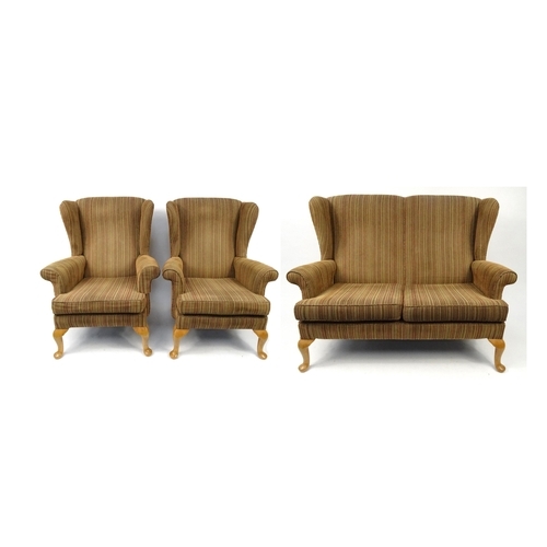 126A - Three piece wing back suite comprising two seater setee and two arm chairs with wooden cabriole free... 