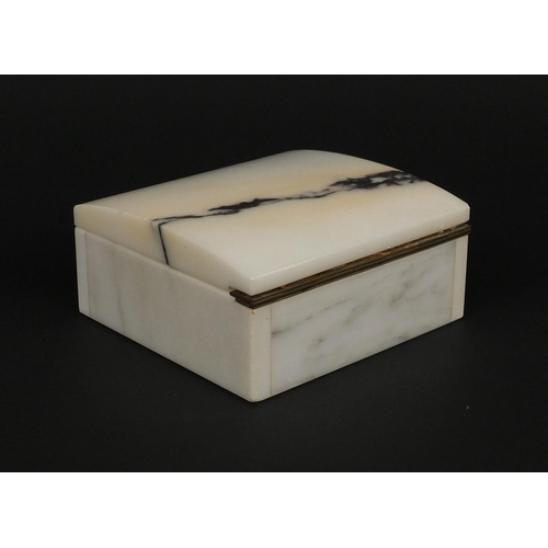 55 - Marble cigarette box made from the marble taken from the walls of the stock exchange building when d... 