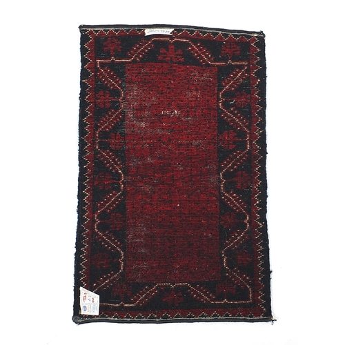 329 - Collection of Middle Eastern saddle cloths, the largest 130cm wide