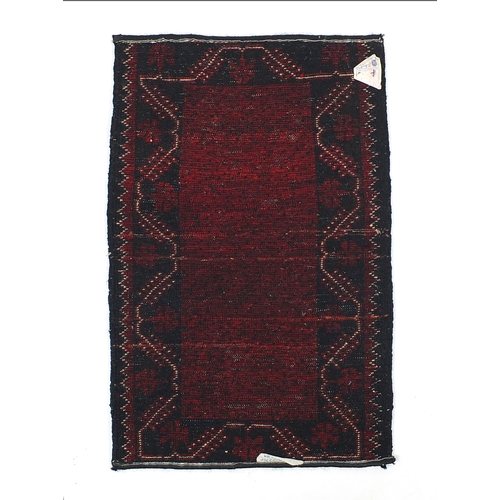 329 - Collection of Middle Eastern saddle cloths, the largest 130cm wide