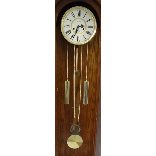 80A - Wood & Sons oak longcase clock with 31-day spring-driven movement, 196cm high