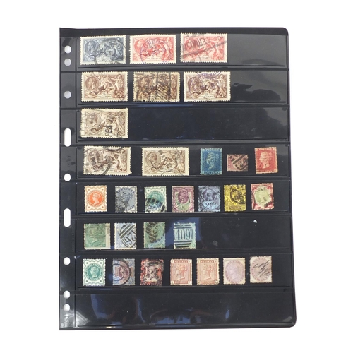 243 - Sheet of Victorian and later stamps mounted on a card including seahorses and a penny red