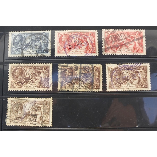 243 - Sheet of Victorian and later stamps mounted on a card including seahorses and a penny red