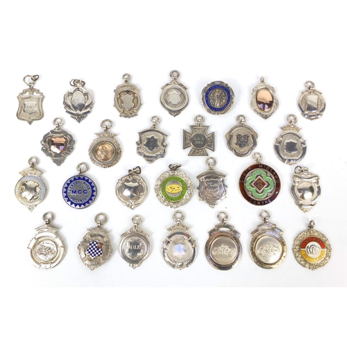 166 - Collection of twenty seven silver motorcycling jewels, some 1930's examples, mostly awarded to E Ken... 