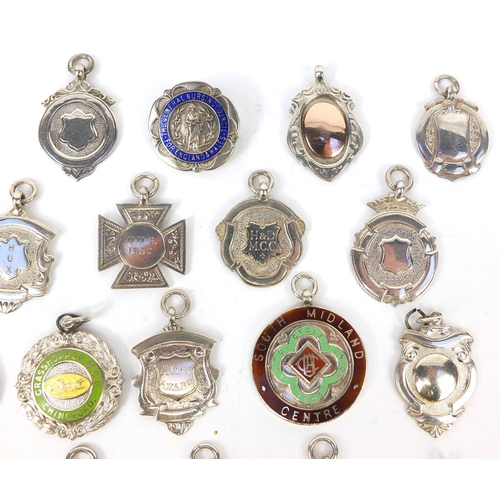 166 - Collection of twenty seven silver motorcycling jewels, some 1930's examples, mostly awarded to E Ken... 