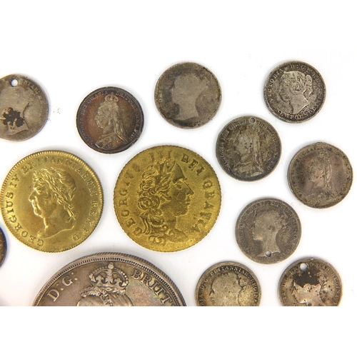 264 - Group of British and World coinage, some silver examples, including an 1889 crown, 19th century Maun... 