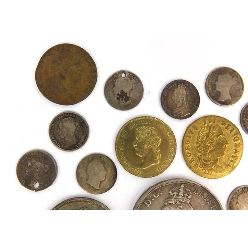 264 - Group of British and World coinage, some silver examples, including an 1889 crown, 19th century Maun... 